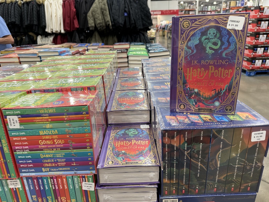 “Harry Potter and the Goblet of Fire” Interactive Illustrated Edition by J.K. Rowling stacked in the book aisle.