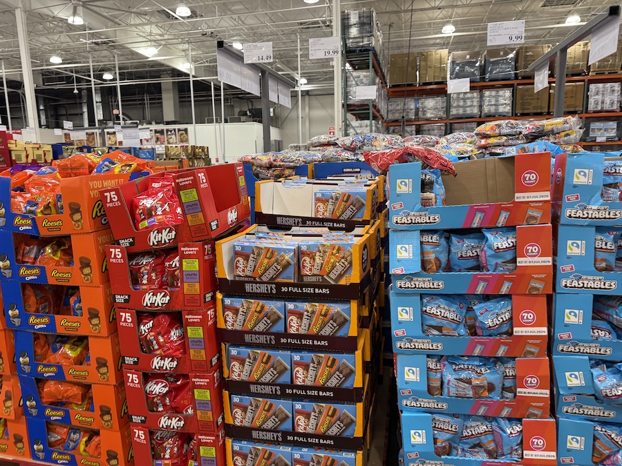 Hershey’s Assorted Bar Variety Pack 30-count boxes stacked in the candy aisle.