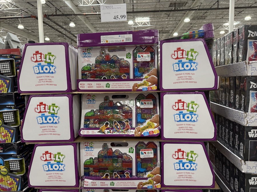 Jelly Blox Mega Pack with bright colorful building pieces spilling out.