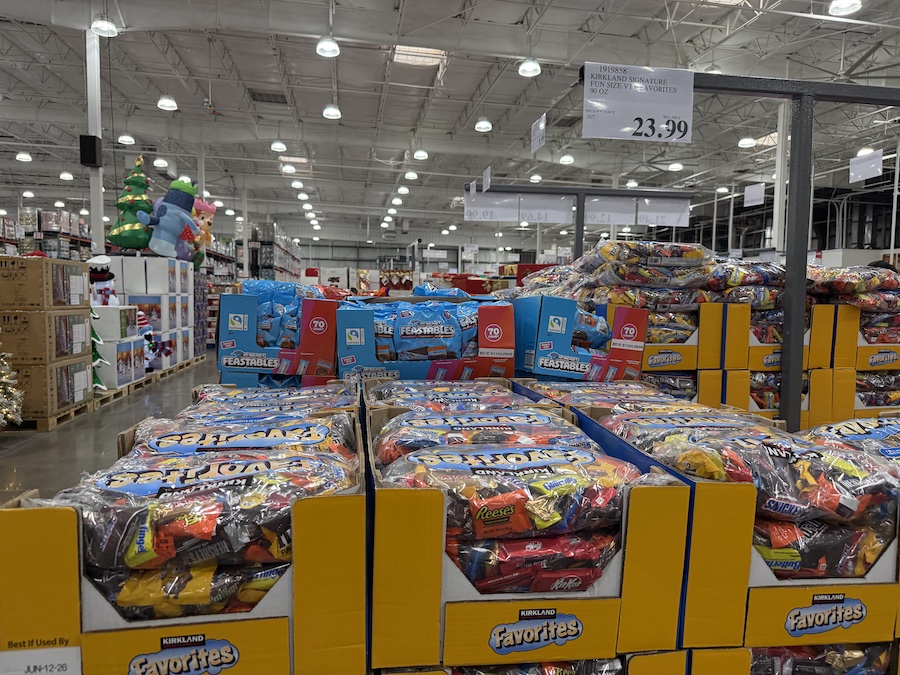 Kirkland Signature Favorites Candy Variety 90 oz bags displayed in large Costco bulk bins.