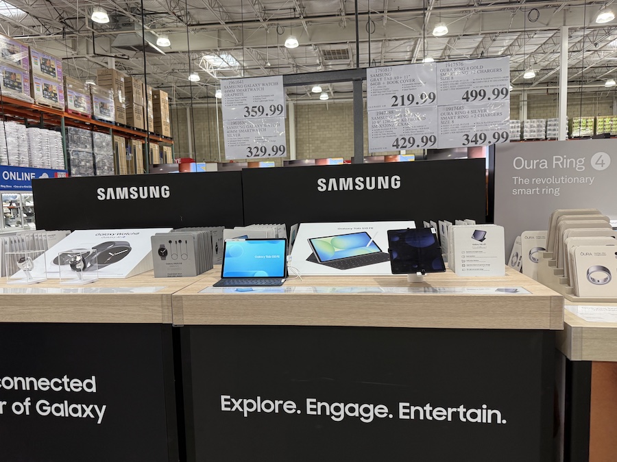 Stand with modern Samsung models.