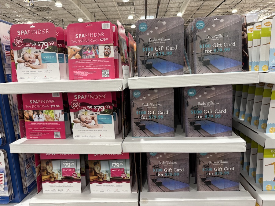 Spafinder and Burke Williams spa gift cards displayed side by side on the Costco gift card rack.