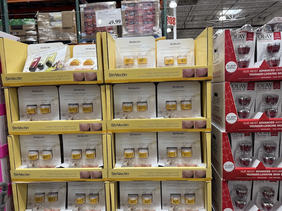 Costco display featuring StriVectin 2-pack Contour Restore Face Cream in skincare aisle.