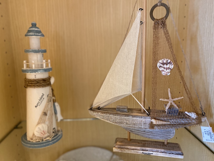 Souvenirs displayed in a souvenir shop on the coast.