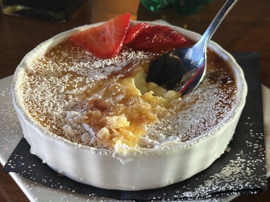 Elegant Italian dessert served at Limoncello Pizzeria Napoletana, beautifully plated with powdered sugar.