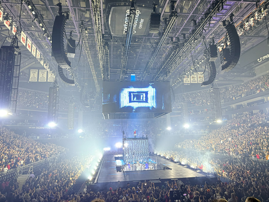 Cool blue tones and digital graphics during Billie Eilish Live 2025