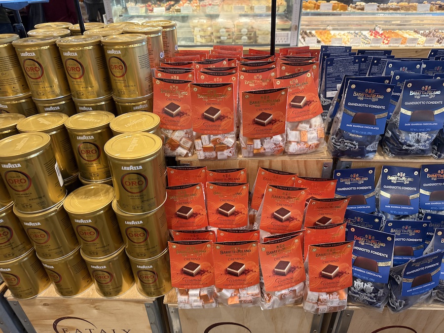 Premium Italian chocolate bars and pralines in bright packaging.