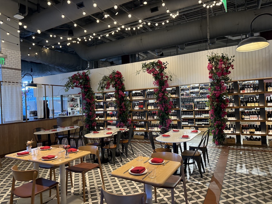 A cozy Italian-style cafe inside Eataly LA overlooking the wine section.