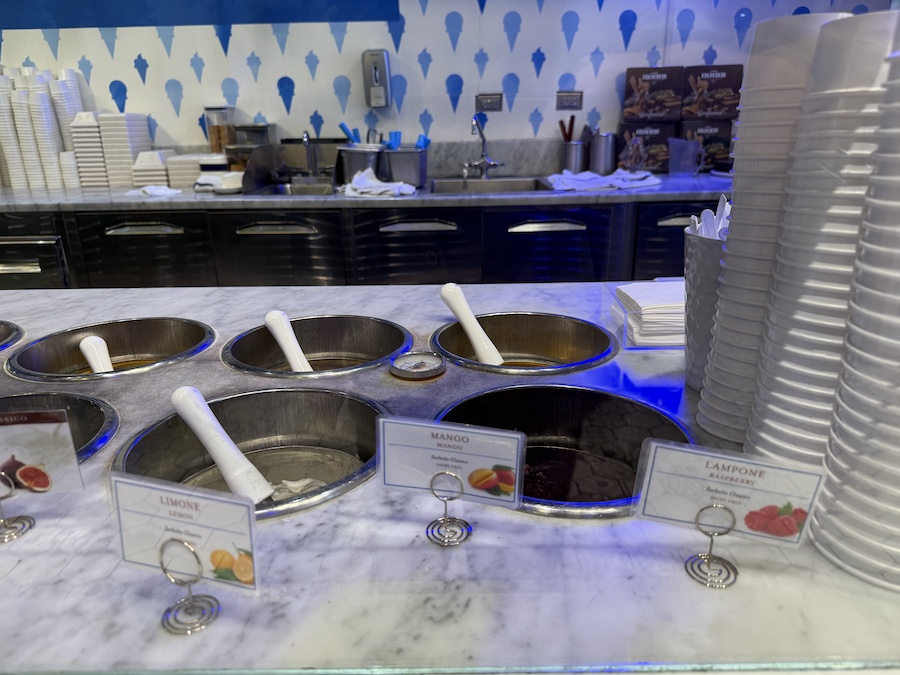 The colorful gelato display case at La Gelateria by Eataly LA, filled with a variety of Italian flavors.