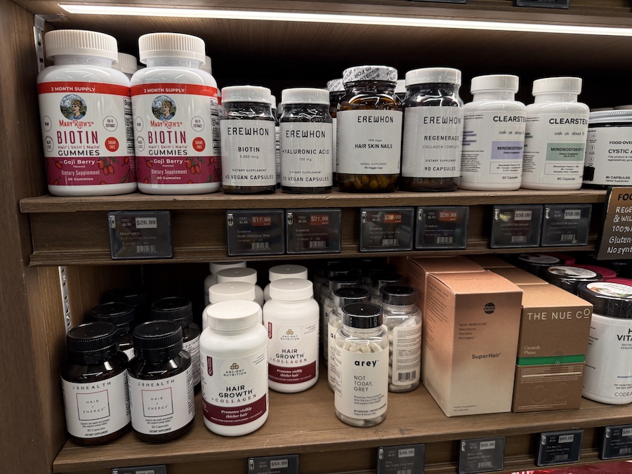 Shelves with products from Mary Ruth’s, JSHEALS, Ancient Nutrition, and The Nue Co, emphasizing natural beauty from within.