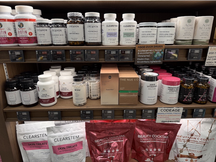 Bottles and jars from Codeage, Arey, Dr. Nigma, and Clearstem, showcasing Erewhon’s premium beauty supplement section.