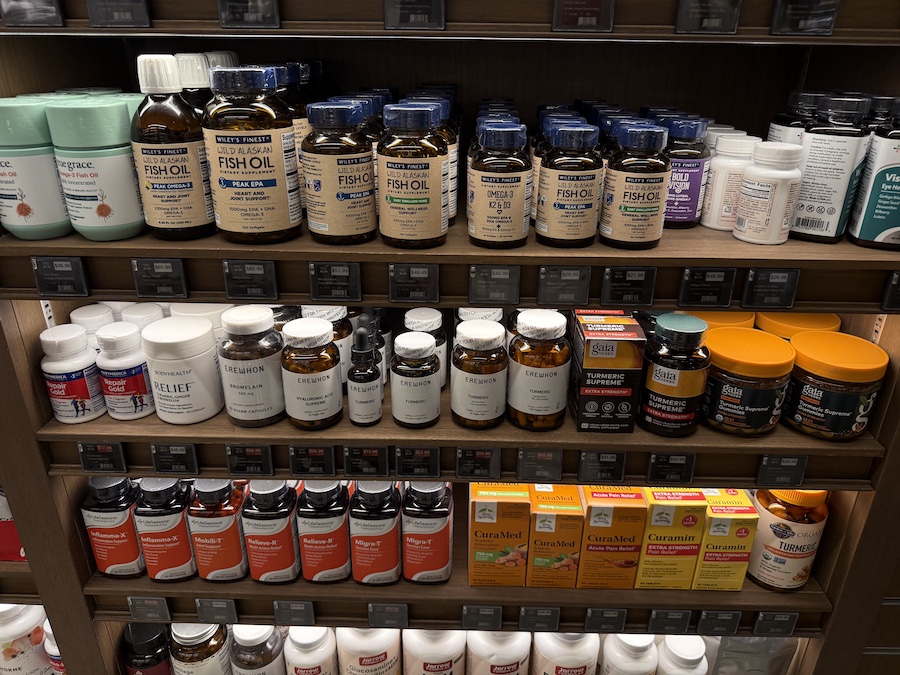 Brightly packaged turmeric and curcumin products from Erewhon, Gaia Herbs, Garden of Life, and Terry Naturally.