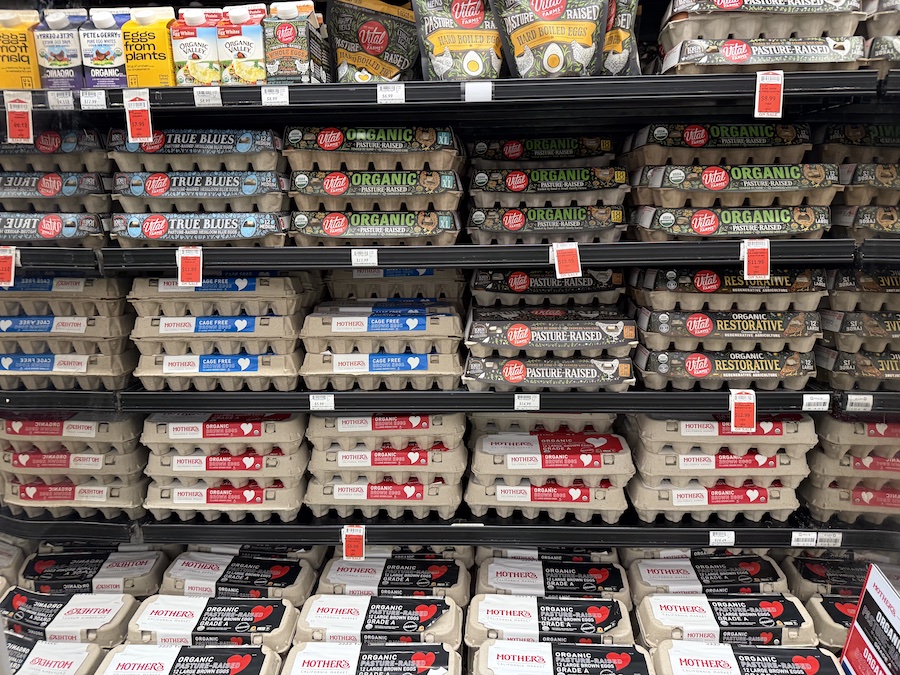 Fresh Vital Farms and house-brand eggs showcased in the chilled section.