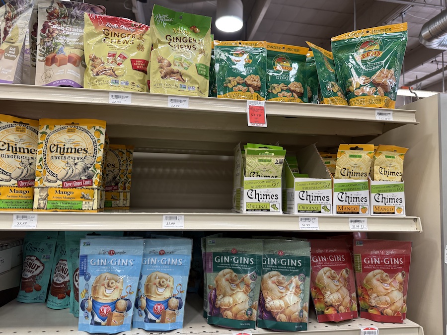 Packages of Ginger Chews by Chimes and Prince of Peace displayed side by side at Mother’s California Market.
