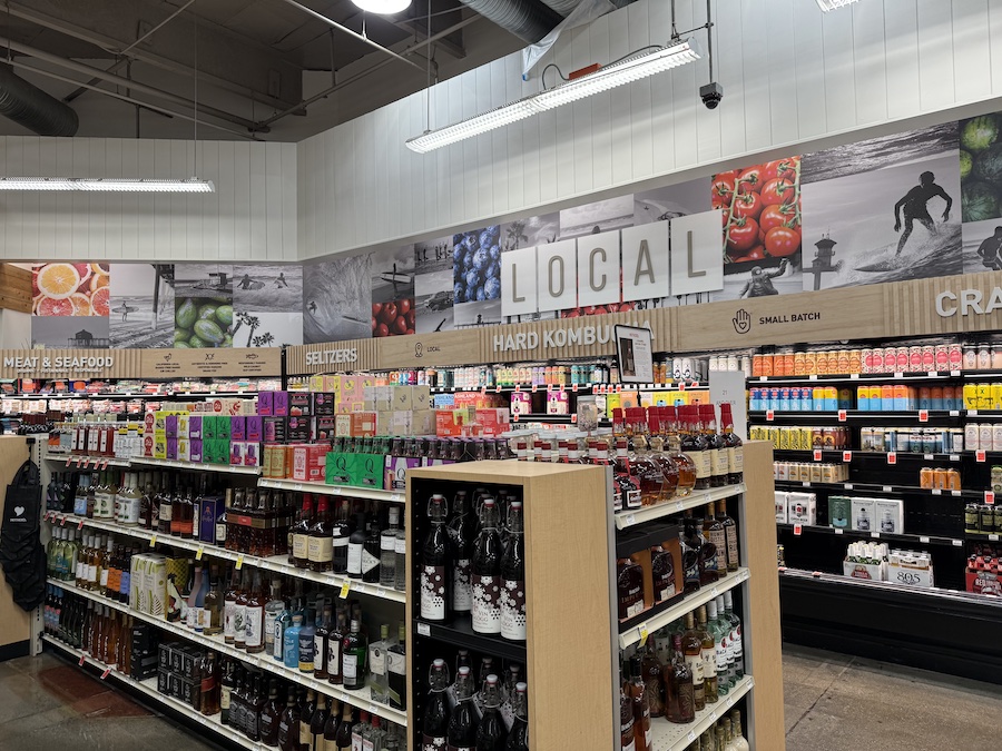 Rows of shelves of local produce at Mother’s California Market