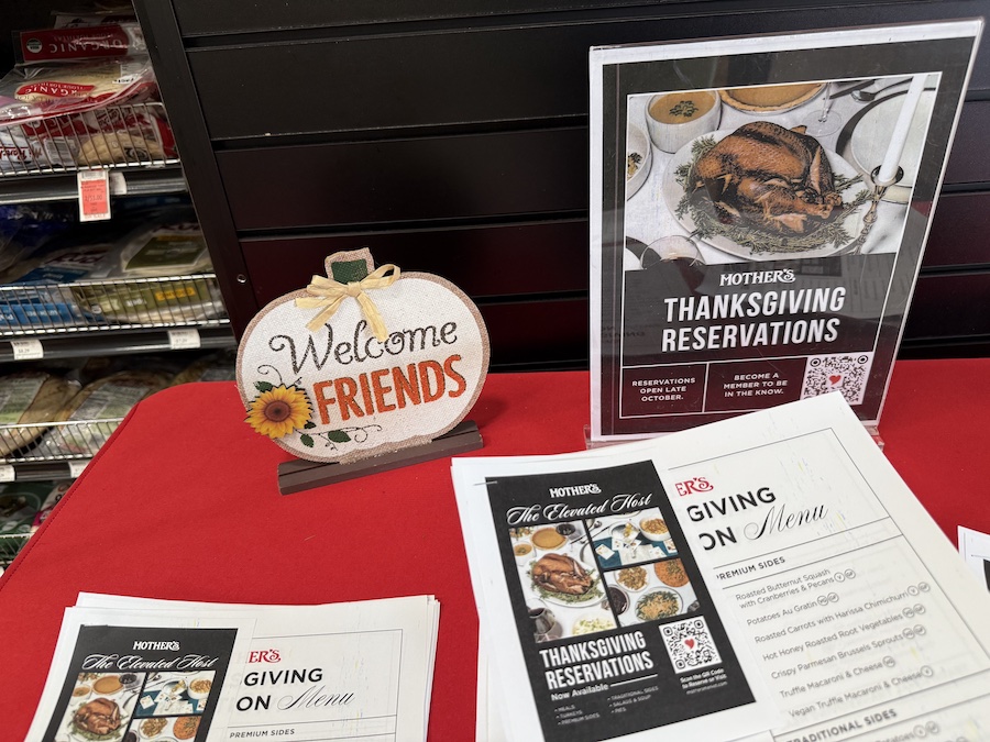 A festive display at Mother’s California Market promoting The Elevated Host Thanksgiving Reservations.