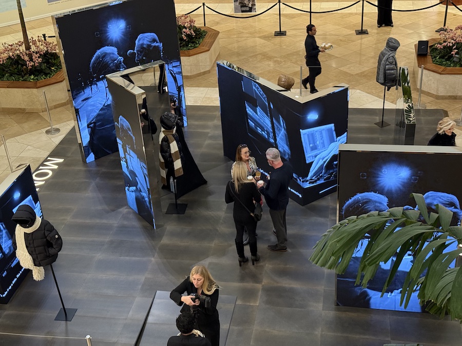 A stylish Moncler display at South Coast Plaza featuring Al Pacino and Robert De Niro for the “Warmer Together” campaign