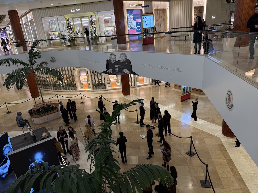 The Cartier store exterior gleams with its gold signage