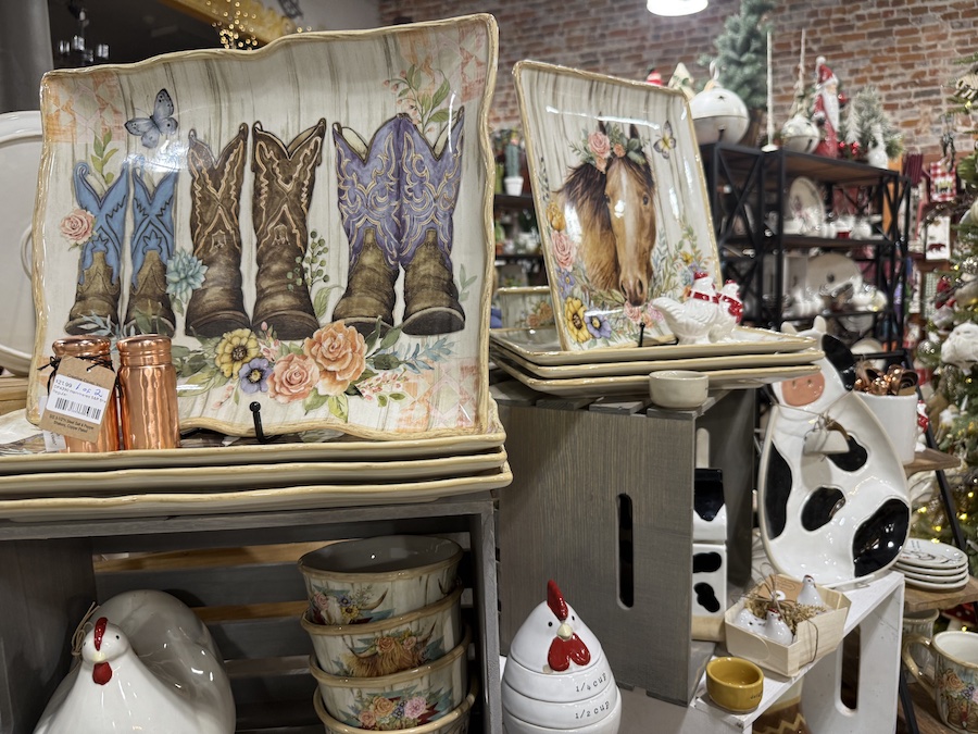 Ornaments, natural textures, and western-style holiday accents arranged in a rustic-themed display at Spice Traveler Prescott.