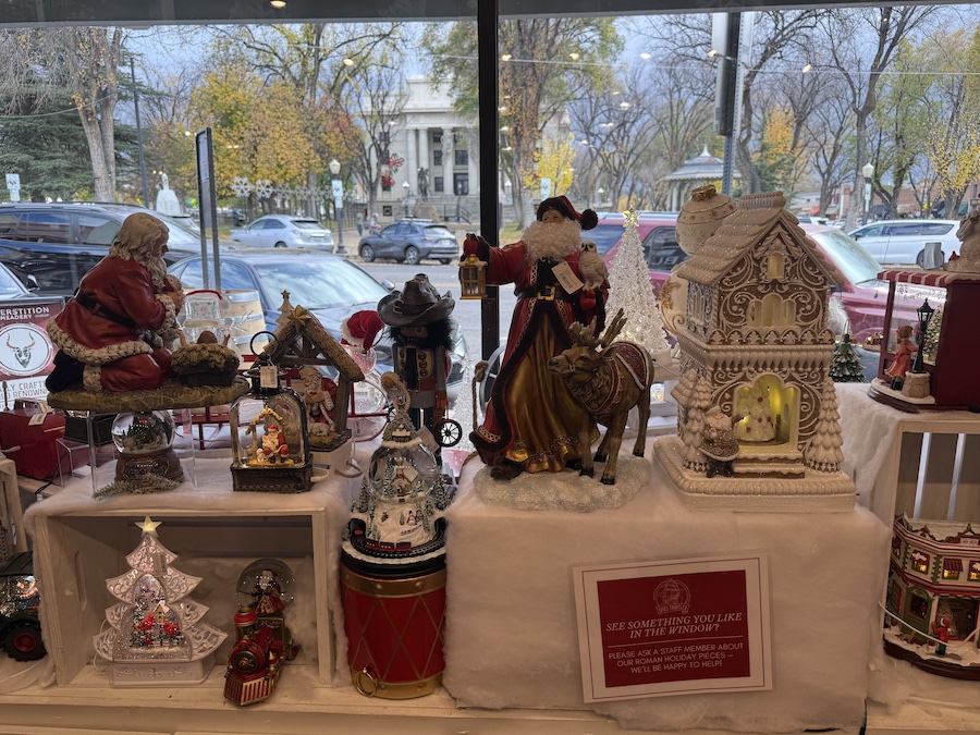 The interior of Spice Traveler is transformed for the holidays, featuring vibrant Christmas decorations.