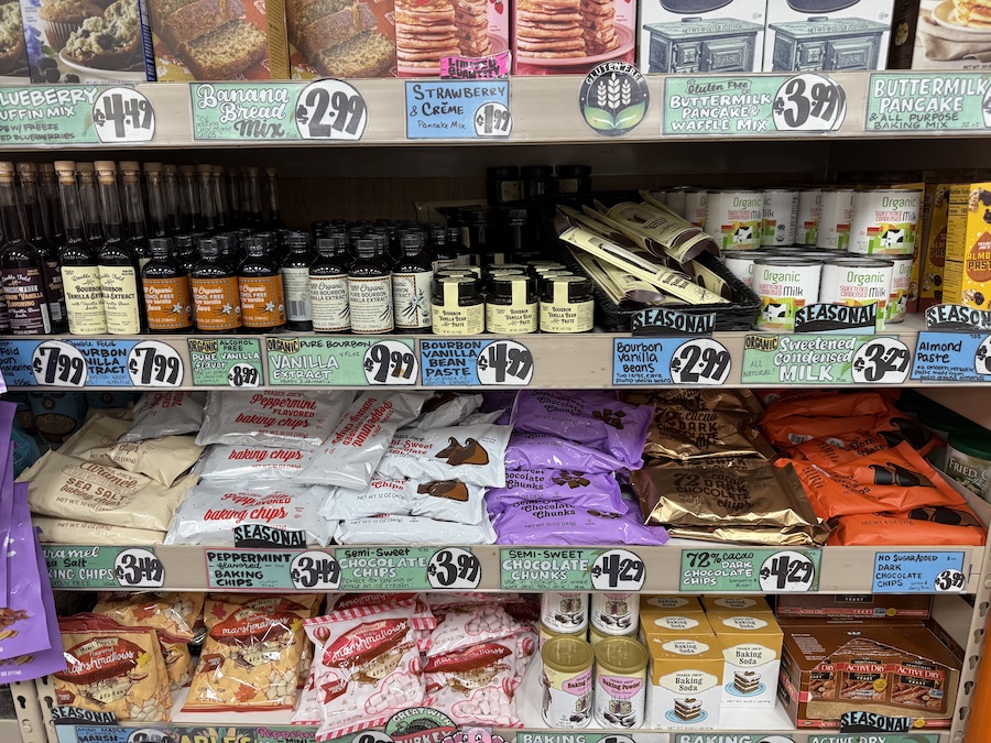 A premium vanilla extract section featuring bourbon vanilla, alcohol-free pure vanilla, vanilla bean paste, and whole beans.