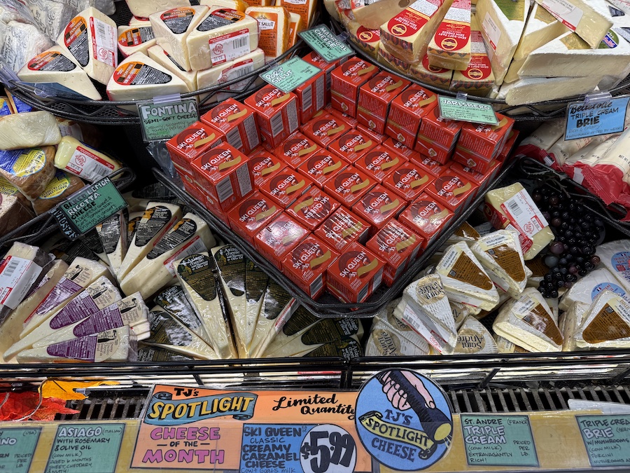 Ski Queen caramelized cheese, rosemary Asiago, Saint André, Brie, Fontina, Port Salut, and Jarlsberg wheels and wedges.