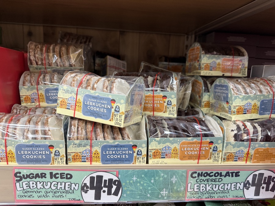 German-inspired lebkuchen displayed in seasonal boxes — spiced, soft, and dusted with sugar for a nostalgic holiday bite.