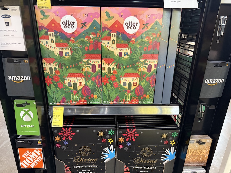 Chocolate advent calendars from Alter Eco and Divine displayed together, featuring eco-friendly and fair-trade holiday packaging.