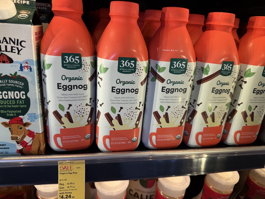 365 by Whole Foods Market eggnog displayed on a refrigerated shelf, emphasizing the store’s house brand.