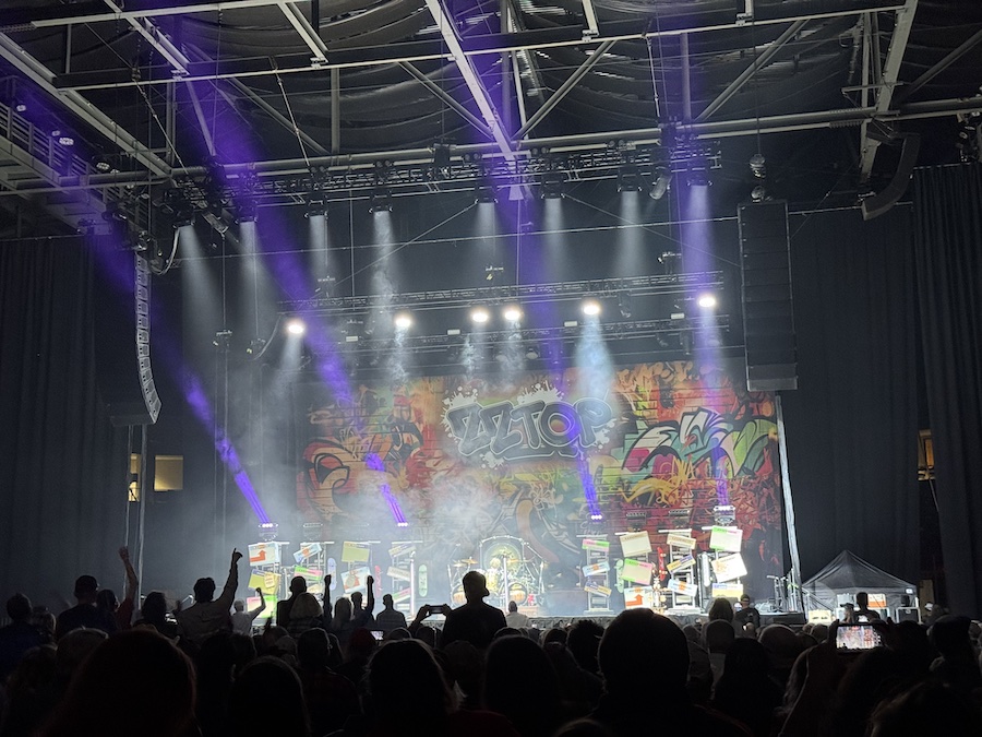 Fans are eagerly awaiting the start of the legendary band's concert.