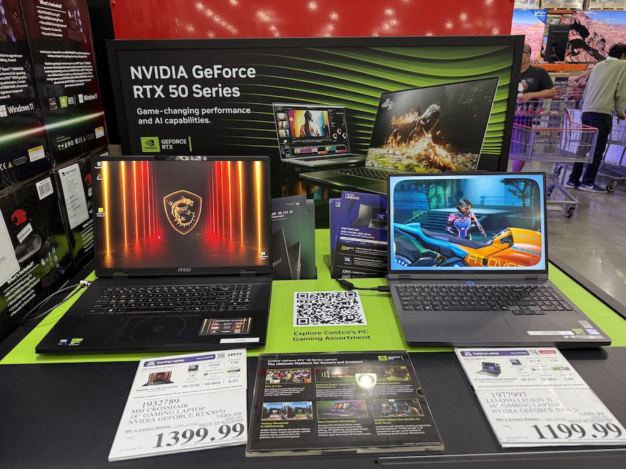 A tech aisle display featuring gaming laptops equipped with NVIDIA GeForce RTX 50 Series graphics cards. 