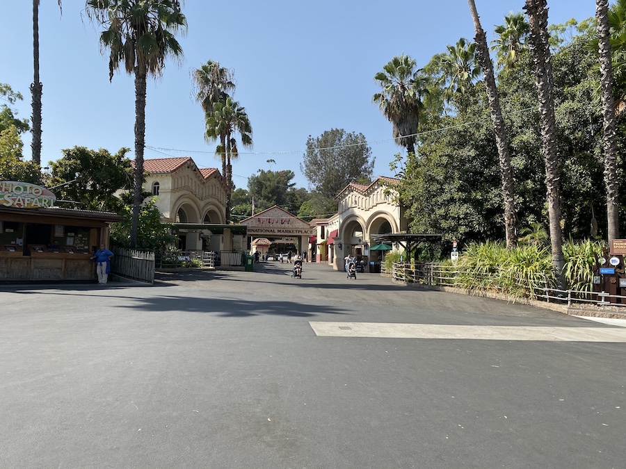A bright, sunny view of the main entry plaza of the Los Angeles Zoo.