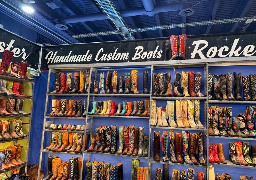 Rocketbuster Handmade Custom Boots stand at the Christmas 2025 event, Las Vegas