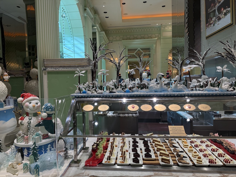 Interior buffet area decorated with elegant holiday arrangements and seasonal colors.