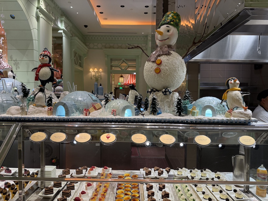 Festive displays inside the buffet highlighting Christmas desserts and themed décor.