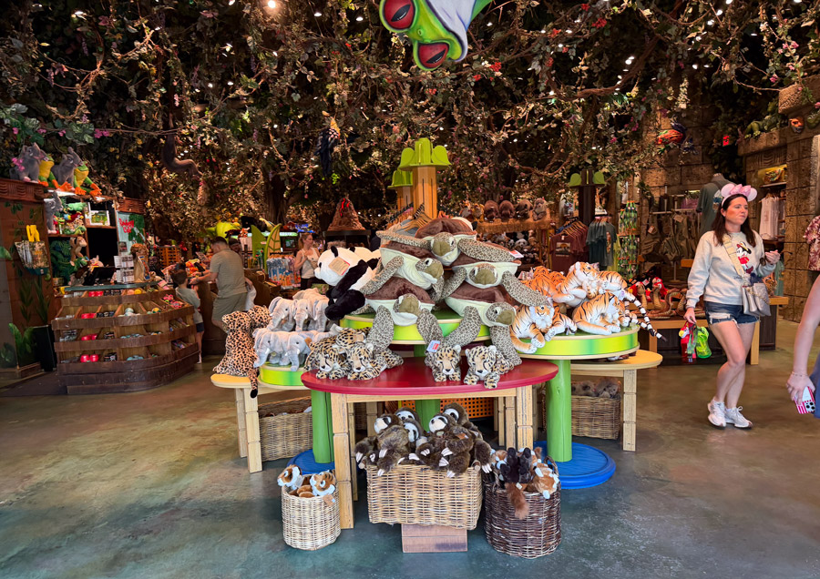 Animal Kingdom gift shop with plush animal toys and jungle-themed souvenirs in Disney World Orlando.