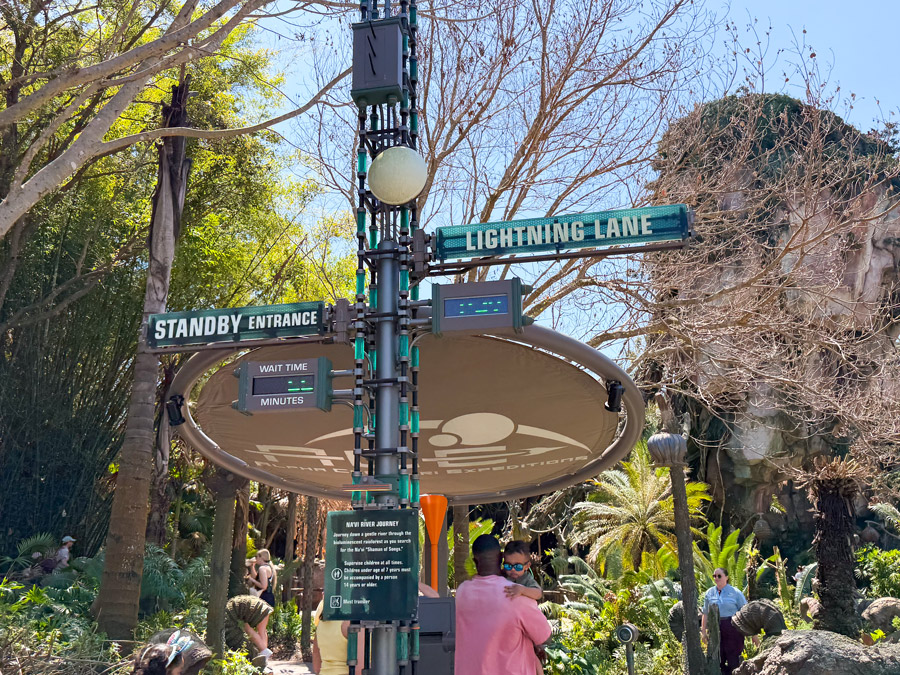 Na’vi River Journey entrance with Lightning Lane and standby signs at Disney’s Animal Kingdom Pandora.