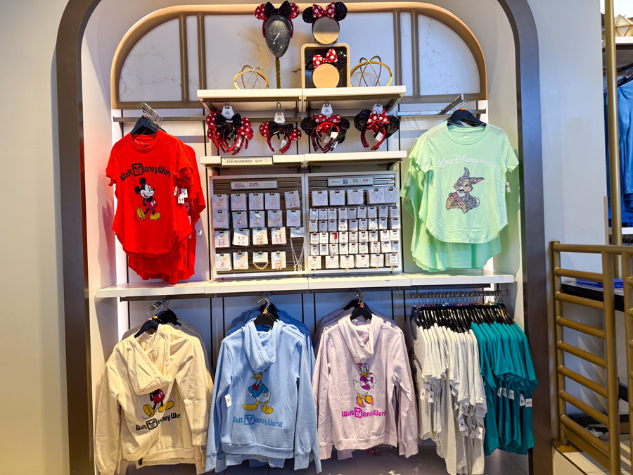 Mickey Ears headband display with interchangeable character pieces at Disney World 2026 merchandise store.
