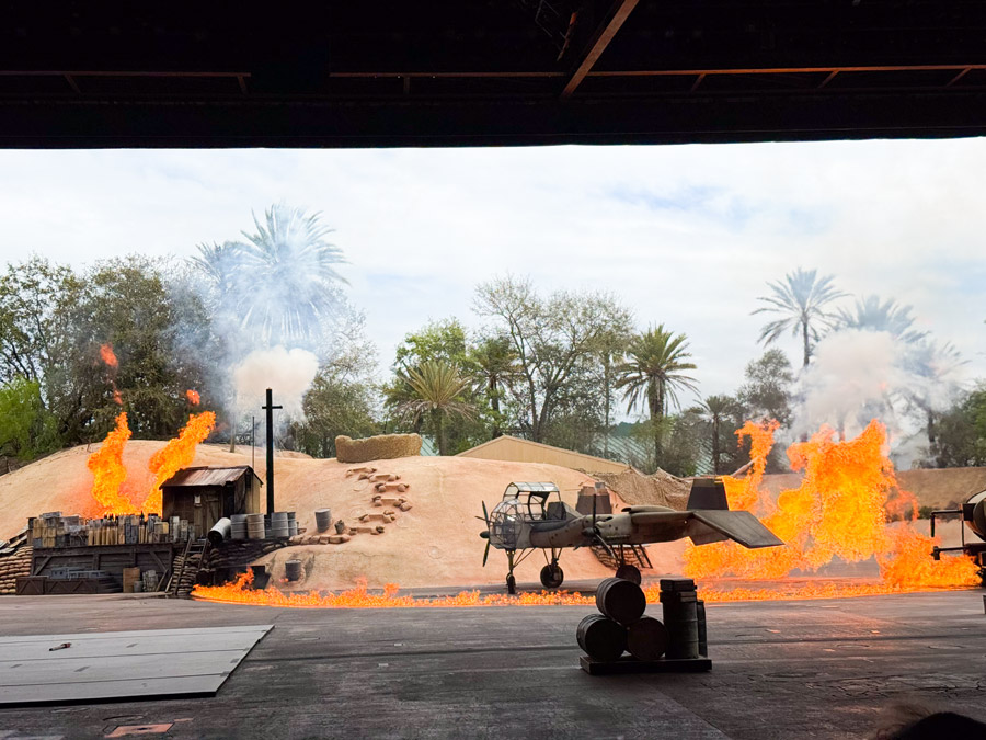 Explosion scene with fire effects and airplane during the Indiana Jones stunt show at Disney’s Hollywood Studios in Orlando.