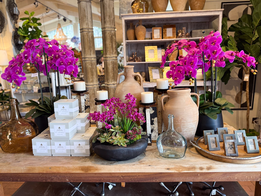 Purple orchids and gift boxes at Roger's Gardens.