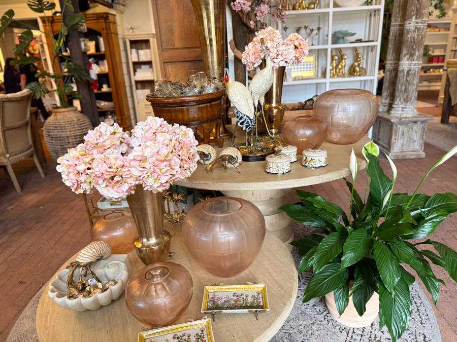 Pink glass vases and spring decor - Roger's Gardens.