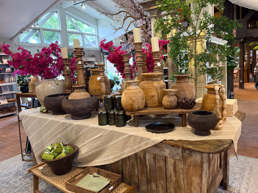 Rustic wood decor vases and candlesticks at Roger's Gardens.
