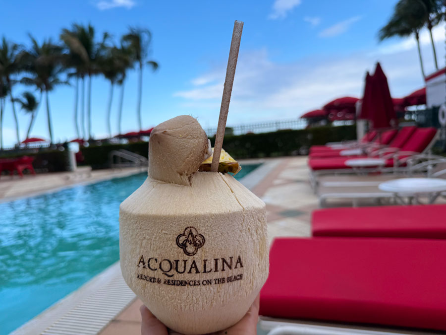 Fresh coconut drink served poolside at Acqualina Resort in Sunny Isles Beach.
