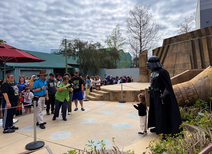Guests meeting Darth Vader during a Disney Visa Cardmember character experience at Disney's Hollywood Studios