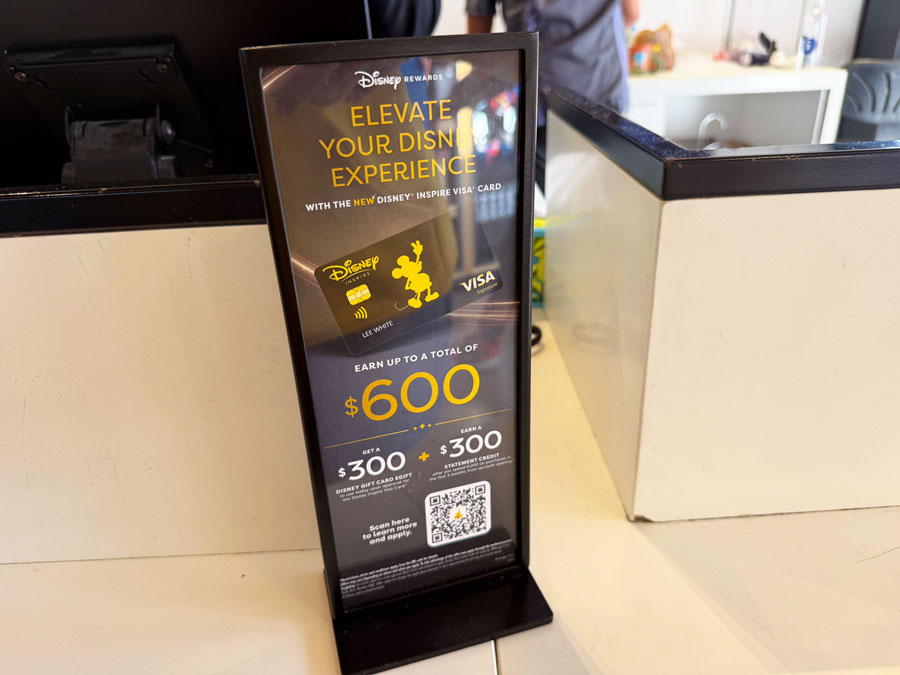Disney Visa card promotional display showing Disney Rewards benefits at Walt Disney World
