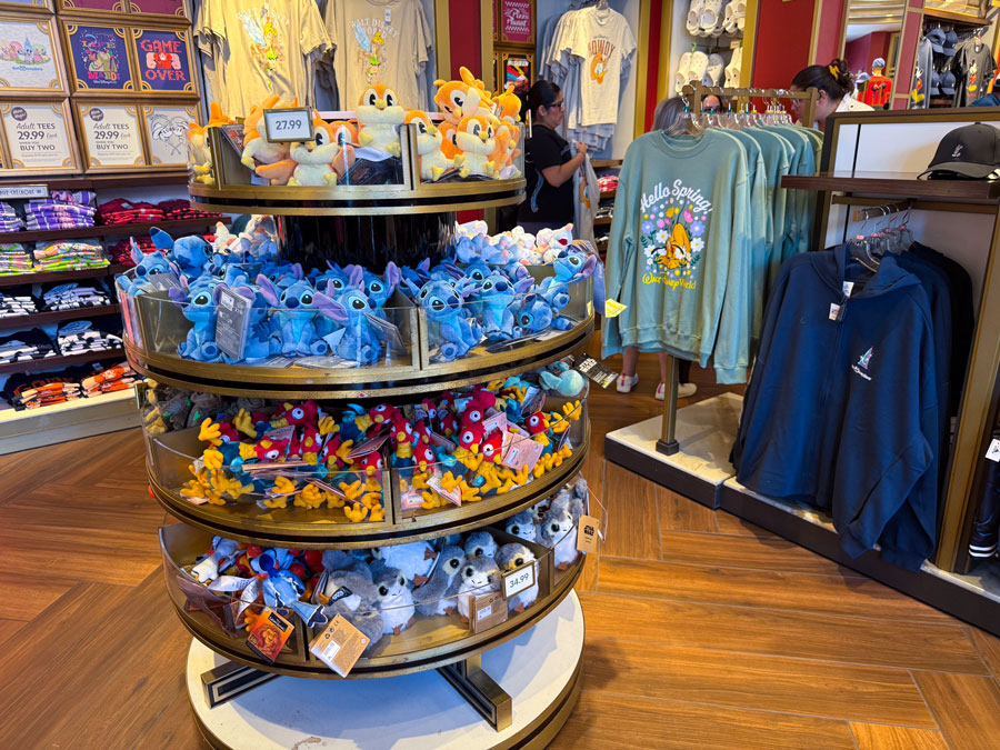 Disney plush toys and merchandise inside a Walt Disney World gift shop