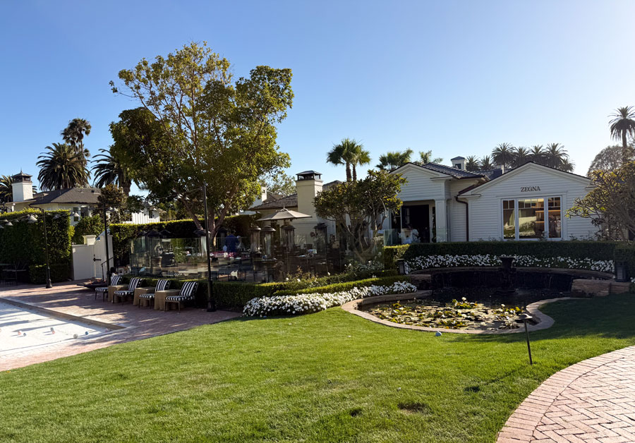 Rosewood Miramar Beach garden lawn with pond, Zegna boutique and bocce court