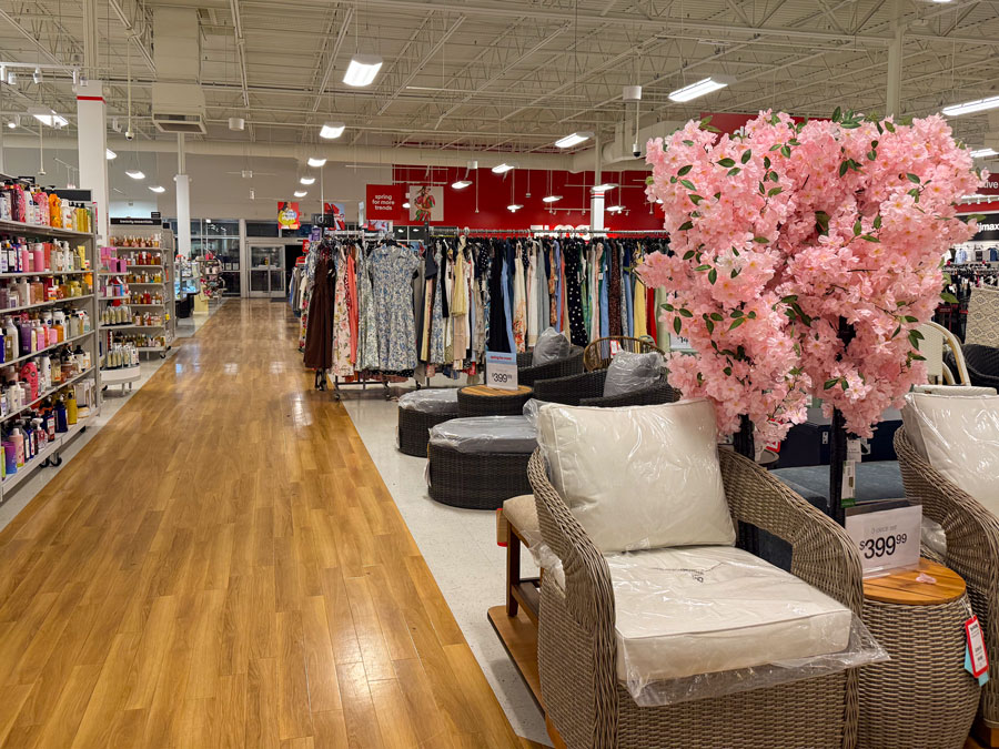 Interior view of TJ Maxx featuring fashion, beauty, and home décor departments.