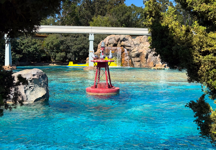Finding Nemo Submarine Voyage lagoon with a yellow submarine and seagull figures