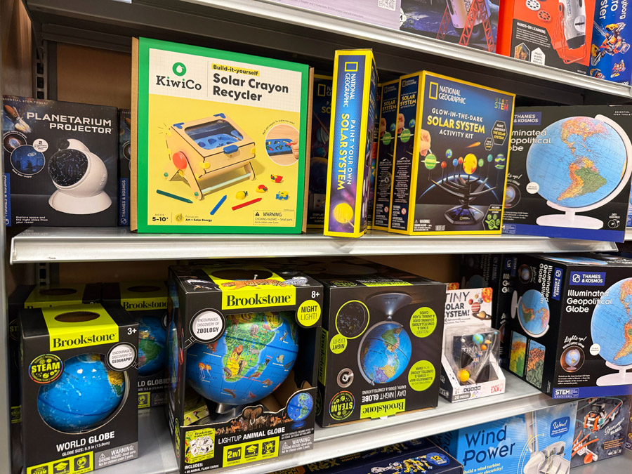 KiwiCo Solar Crayon Recycler beside STEM and science kits